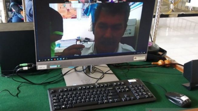 Johan Anuar saat menjalani sidang virtual di Pengadilan Tipikor Palembang [ANTARA]