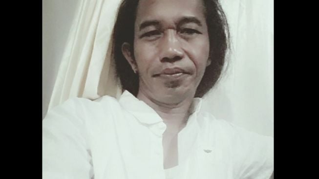 Imron Gondrong, pria mirip Presiden Jokowi. (Facebook)