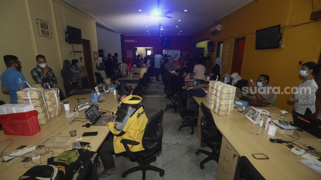 Suasana acara Syukuran Tahunan Suara.com di Kantor Redaksi Suara.com, Jakarta, Rabu (30/12/2020). [Suara.com/Angga Budhiyanto]