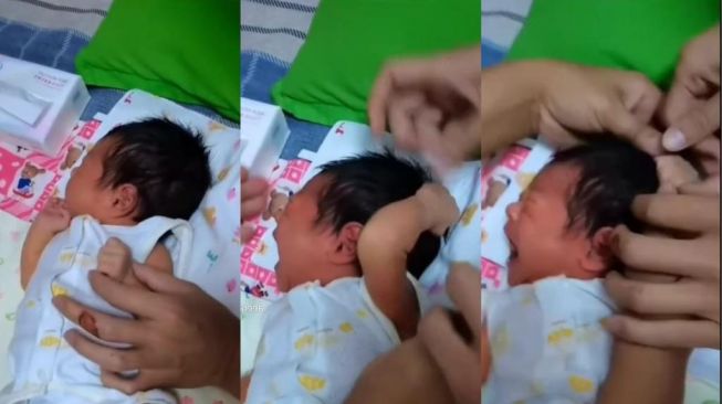 Viral Bayi Kejer Jambak Rambut Sendiri, Warganet: Udah Pinter Drama Ya