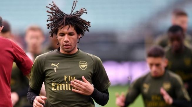 Subhanallah! Mohamed Elneny Umroh Ramadhan untuk Pemulihan Cedera Lutut