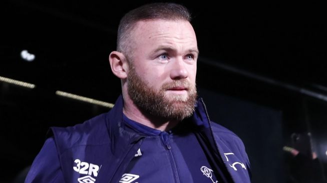 Wayne Rooney resmi jadi manajer Derby County. [ADRIAN DENNIS / AFP]