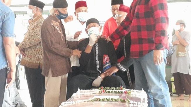 Tangis keluarga sambut jenazah pramugari Isti, korban Sriwijaya Air. (Suara.com/_Wivy Hikmatullah