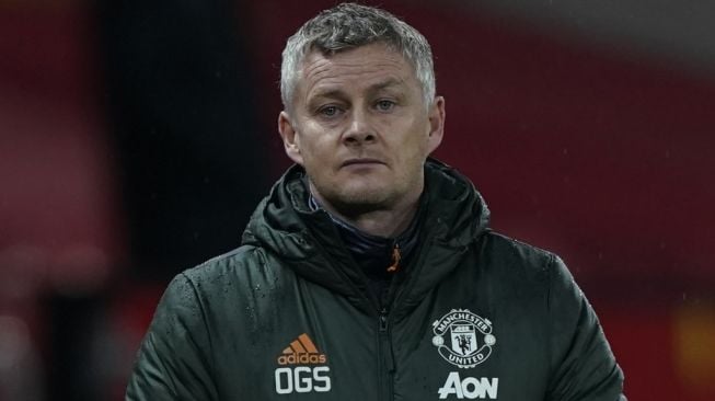 Ekspresi kekecewaan manajer Manchester United, Ole Gunnar Solskjaer melihat performa timnya pada laga Liga Inggris 2020/2021 kontra Sheffield United di Old Trafford, Kamis (28/1/2021). [TIM KEETON / POOL / AFP]