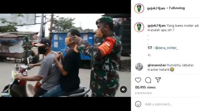 Anggota TNI pakaikan masker untuk pemotor (Instagram)