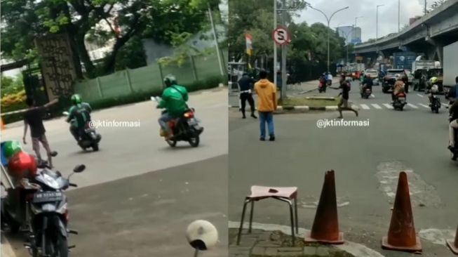 Tangkapan layar aksi koboi jalanan dengan menggunakan senjata jenis airsoft gun yang viral di sekitar Green Mansion, Cengkareng, Jakarta Barat, Kamis (4/2/2021). [Instagram@jkt.informasi]