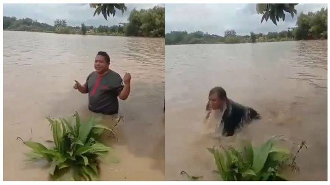 Kocak! Lagi Asyik Beritakan Banjir, Pria ini Malah Tercebur