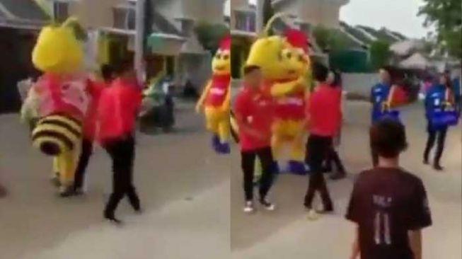 Kolase dari video maskot Alfamart dan Indomaret bertemu di pinggir jalan. [Tangkapan layar Instagram]