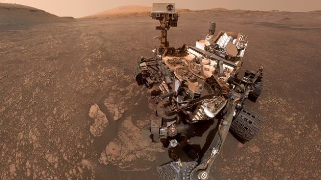 Robot Curiosity saat melakukan penjelajahan di Planet Mars.[NASA]