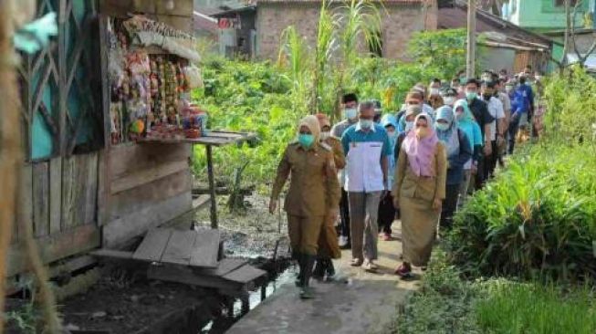 Fitri : Bongkar Bangunan yang Menutup Saluran