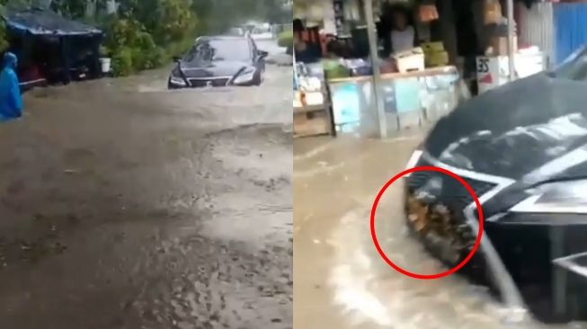 Mobil Mewah Ini Nekat Terjang Banjir, Endingnya Malah Jadi Penyaring Sampah