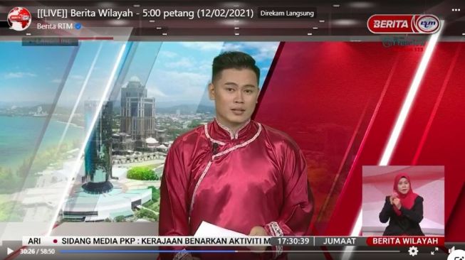 Dikira Pakai Baju Cheongsam untuk Wanita, Presenter Berita Ini Dikritik (facebook.com/BeritaRTM)