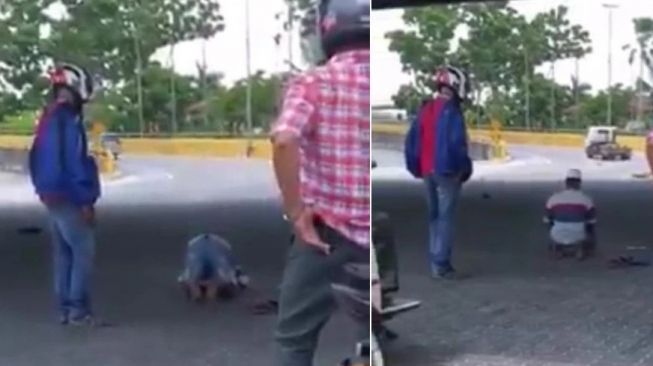 Heboh Pria Salat di Tengah Jalan, Pengendara Lain Amankan Lalu-lintas