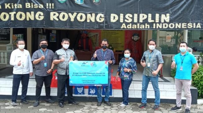 WOM Finance Kasih Bantuan Pandemi Covid-19 di Wilayah Zona Merah