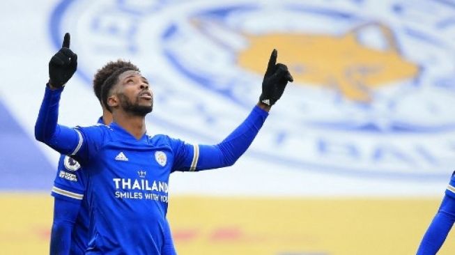 Striker Leicester City Kelechi Iheanacho merayakan golnya ke gawang Sheffield United dalam lanjutan Liga Inggris di King Power Stadium. Lindsey Parnaby / POOL / AFP