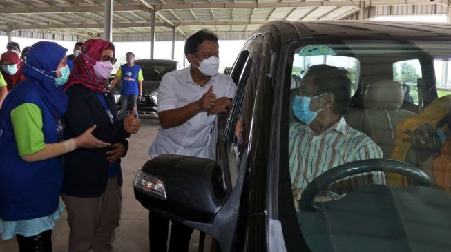 Sentra Vaksinasi Drive Thru Pertama Hadir di Depok, Kamis (25/3/2021). [Xl Axiata]