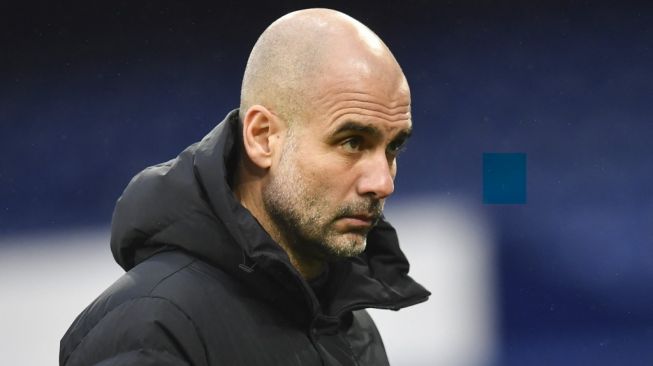 Manajer Manchester City, Pep Guardiola. [PAUL ELLIS / AFP / POOL]