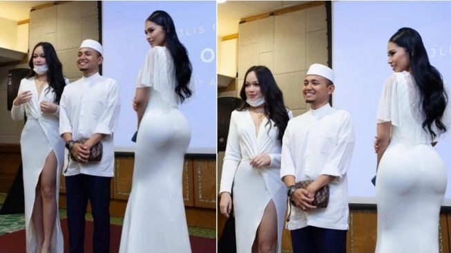 Seorang ustad di Malaysia yang banjir kecaman setelah berpose dengan selebgram seksi.[Instagram via World of Buzz]