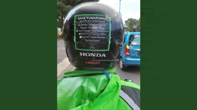 Dedikasi driver ojol tunarungu. [Twitter]