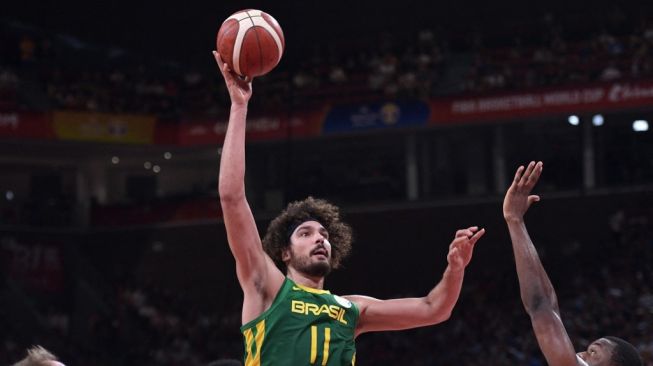 Anderson Varejao saat memperkuat Timnas Basket Brasil. [Nicolas ASFOURI / AFP]