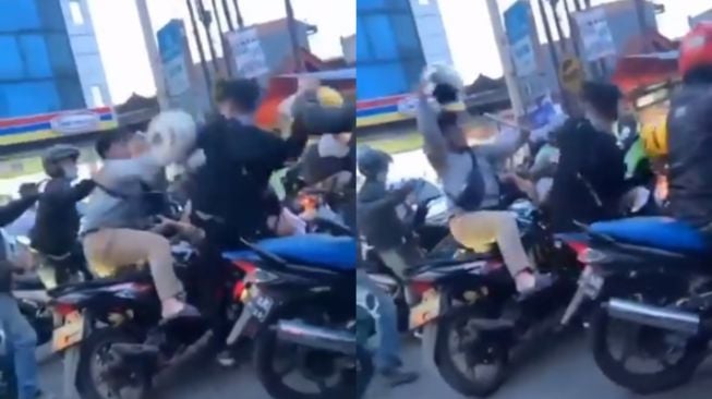 Aksi baku hantam pengendara motor. (Twitter)