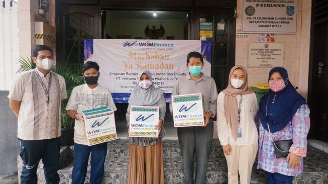 WOM Finance Bagikan 3.900 Bingkisan Ramadhan ke Janda dan Dhuafa