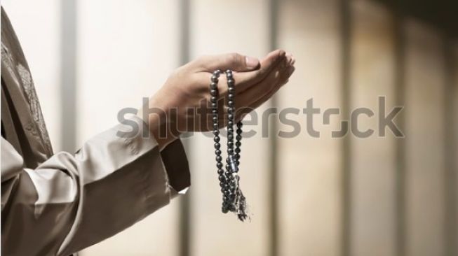 berdoa [shutterstock]