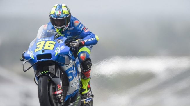 Rider andalan Suzuki Ecstar tampil dalam MotoGP Prancis yang digelar di Sirkuit Le Mans, Minggu (16/5/2021) malam WIB. [JEAN-FRANCOIS MONIER / AFP]