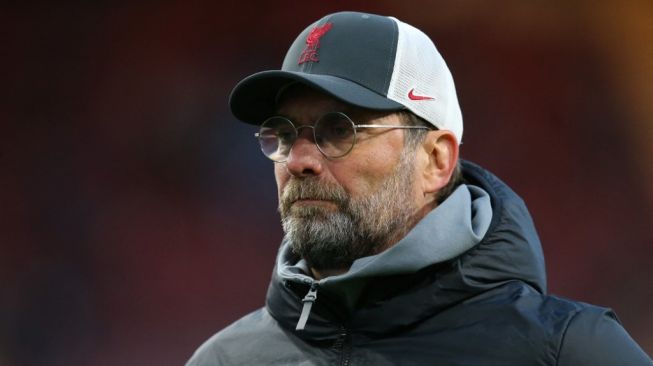 Pelatih Liverpool, Jurgen Klopp pada laga Liga Inggris 2020/2021 kontra Burnley di Turf Moor, Kamis (20/5/2021) dini hari WIB. [ALEX LIVESEY / POOL / AFP]