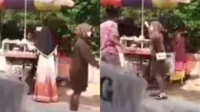 Viral Wanita Gagalkan Aksi Dua Pria Berkelahi Bawa Parang, Emak-emak Hero