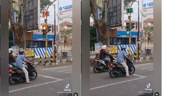 Pemotor kena prank di persimpangan lampu merah (TikTok)