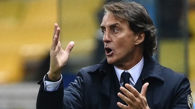 Pelatih Timnas Italia, Roberto Mancini. [Marco BERTORELLO / AFP]