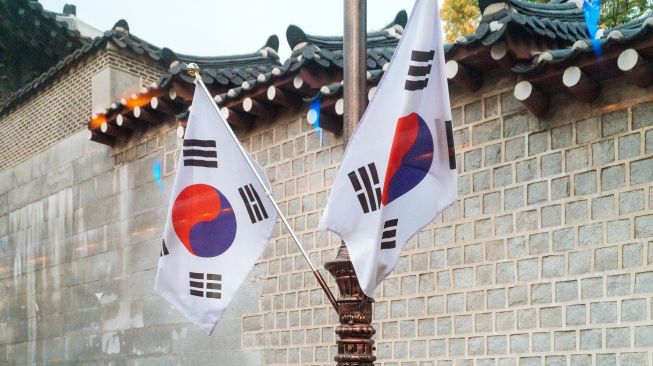 Ilustrasi bendera Korea Selatan.[Unsplash/Stephanie Nakagawa]