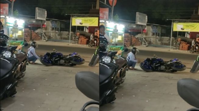 Cewek rusak motor pakai batu. (Tiktok/@adiirawan72)