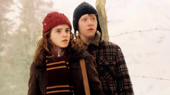 Rupert Grint dan Emma Watson. [IMDb]