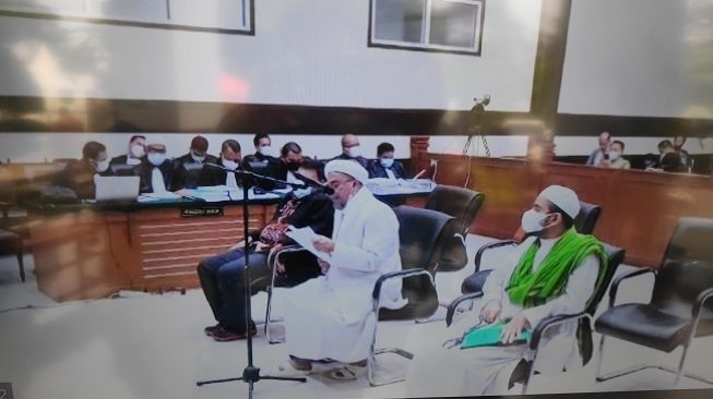 Sidang Habib Rizieq Shihab di kasus swab test RS UMMI, Kamis (10/6/2021). (Foto: bidik layar video)