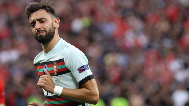 Gelandang serang Timnas Portugal, Bruno Fernandes tampil pada laga Grup F Euro 2020 kontra Hungaria di Puskas Arena, Budapest, Rabu (16/6/2021) dini hari WIB. [BERNADETT SZABO / POOL / AFP]