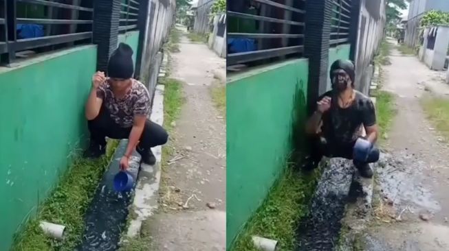 Viral Pria Nekat Mandi Air Comberan Demi Konten, Tuai Kritikan Warganet