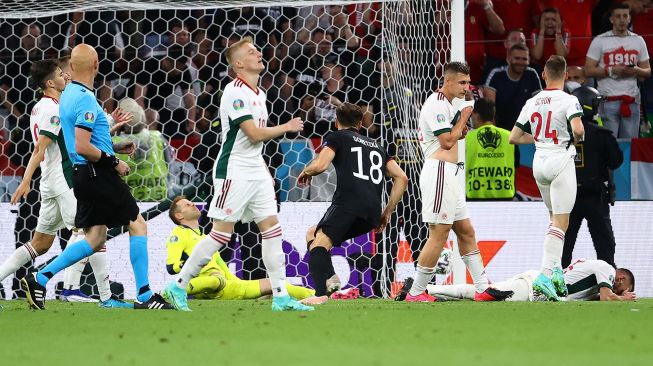 Gelandang Jerman Leon Goretzka mencetak gol kedua timnya selama pertandingan sepak bola Grup F EURO 2020 antara Jerman melawan Hungaria di Allianz Arena di Munich, Kamis (24/6/2021) dini hari WIB.  [AFP/Photo]

