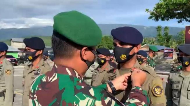 Buru Teroris MIT di Poso, 65 Anggota Polisi Naik Pangkat di HUT Bhayangkara