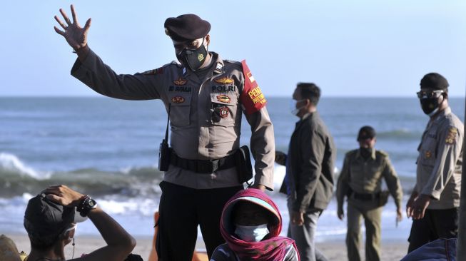Polda Bali Ancam Tutup Akun Medsos Posting Info Buruk PPKM Darurat