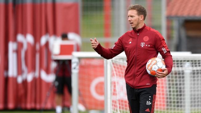 Julian Nagelsmann telah memulai tugasnya sebagai pelatih Bayern Munich untuk menyiapkan masa pramusim jelang kampanye 2021/2022. [Christof STACHE / AFP]