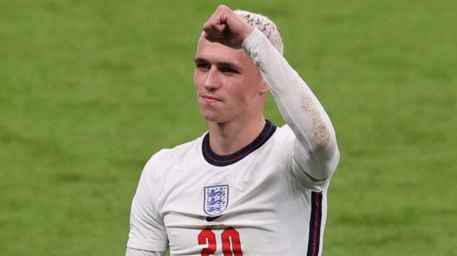 Gelandang serang Timnas Inggris, Phil Foden. [Catherine Ivill / POOL / AFP]