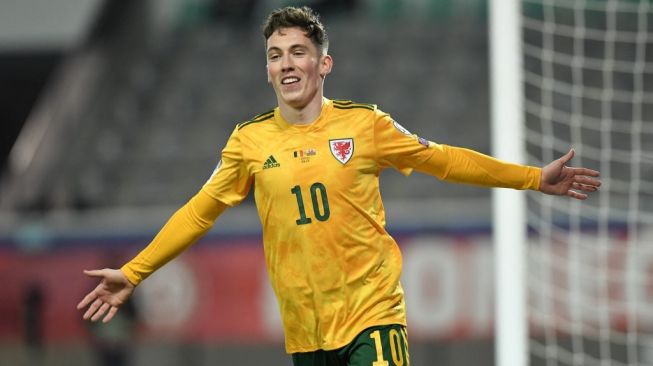 Harry Wilson saat memperkuat Timnas Wales. [JOHN THYS / AFP]