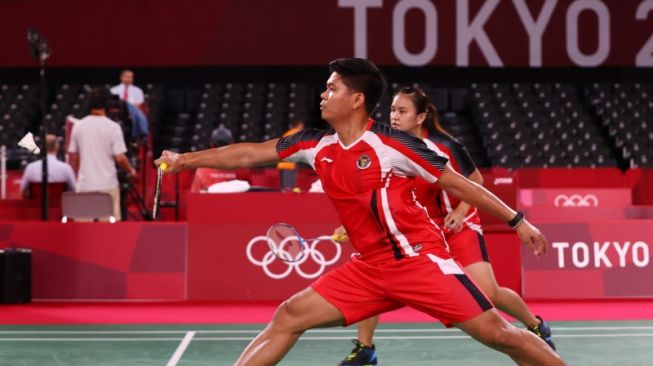 Pasangan ganda campuran Indonesia, Praveen Jordan / Melati Daeva Oktavianti tampil di Olimpiade Tokyo. [ANTARA/REUTERS/LEONHARD FOEGER]