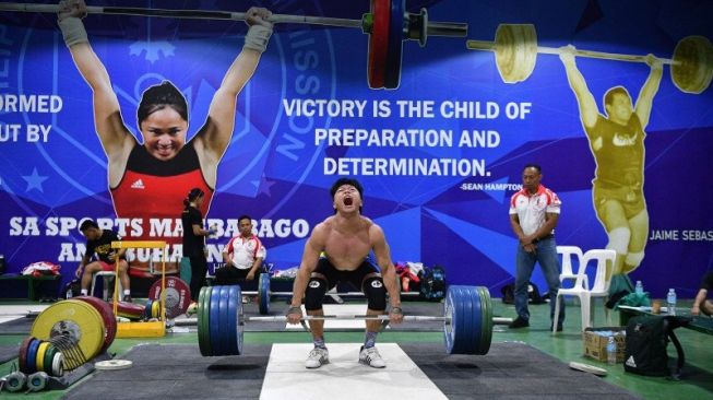 Jelang Berlaga di Olimpiade Tokyo, Lifter Rahmat Erwin Abdullah Dapat Rumah dan Motor