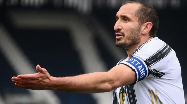 Giorgio Chiellini memperkuat Juventus di musim 2020/2021 lalu. [Marco BERTORELLO / AFP]