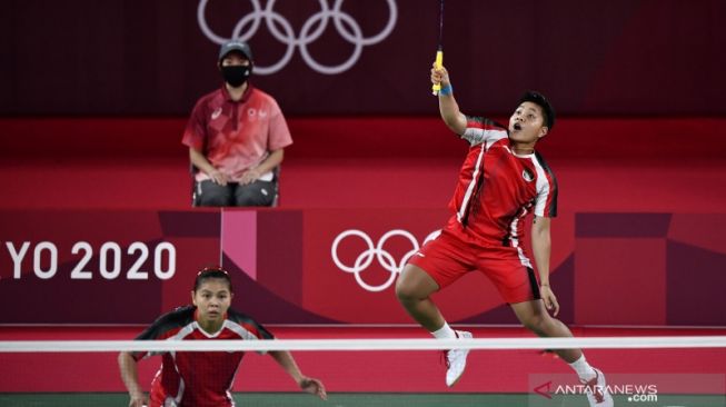 Pebulutangkis ganda putri Indonesia Greysia Polii/Apriyani Rahayu melaju ke babak final usai mengalahkan ganda putri Korea Selatan Lee Sohee/Shin Seungchan dalam semifinal Olimpiade Tokyo 2020 di Musashino Forest Sport Plaza, Tokyo, Jepang, Sabtu (31/7/2021). [ANTARA FOTO/Sigid Kurniawan/foc]