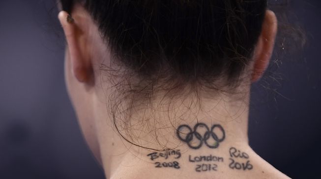 Vanessa Ferrari dari Italia bersiap untuk bertanding di nomor palang tidak rata kualifikasi senam artistik putri pada Olimpiade Tokyo 2020 di Ariake Gymnastics Center, Tokyo, pada (25/7/2021). [Loic VENANCE / AFP]