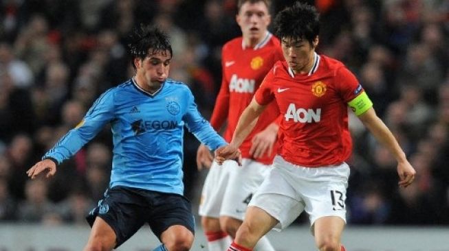 Park Ji-sung saat masih bermain di Manchester United. (ANDREW YATES / AFP)